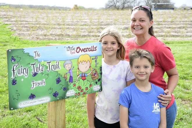 Danielle Rogers with her children Mabel and Luke at Fairy Tale Trail on Missouri Berries farm.