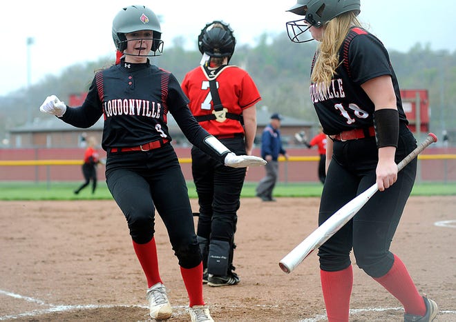 Loudonville's Goldie Layton (18) watches as Mackenzie Cutlip (9) scores during softball action against Mansfield Christian at Loudonville Wednesday, May 4, 2022.
