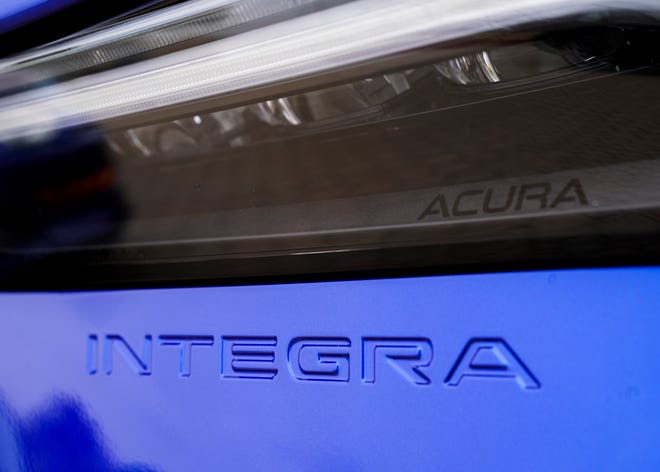 A front headlight detail on the new 2023 Acura Integra A-Spec.