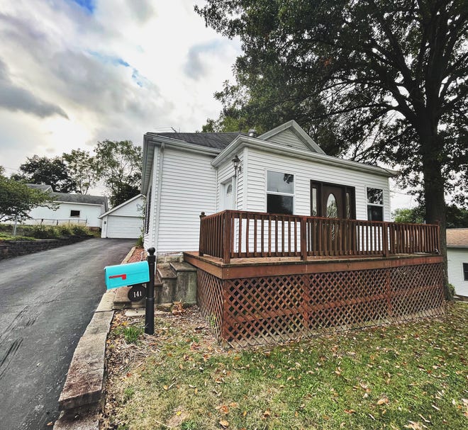 Owners Danielle and Owen Sullivan listed their Carlinville home for sale on Zillow for $169,000.