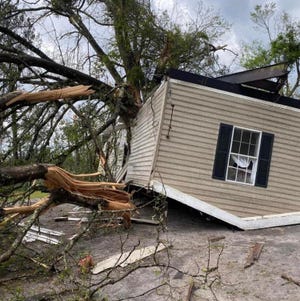 The Driggers' home is photographed after the tornado.