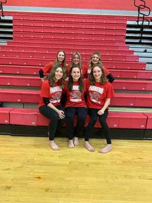 The gymnastics team at Fishers High School, created by Susie Strange, IndyStar's sports mom of the year for 2022. 