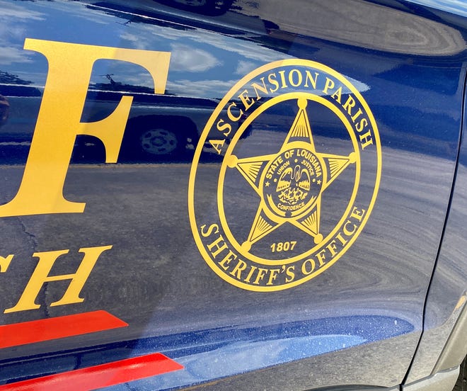The Ascension Parish Sheriff's Office logo is shown on a vehicle parked at the Donaldsonville municipal building.