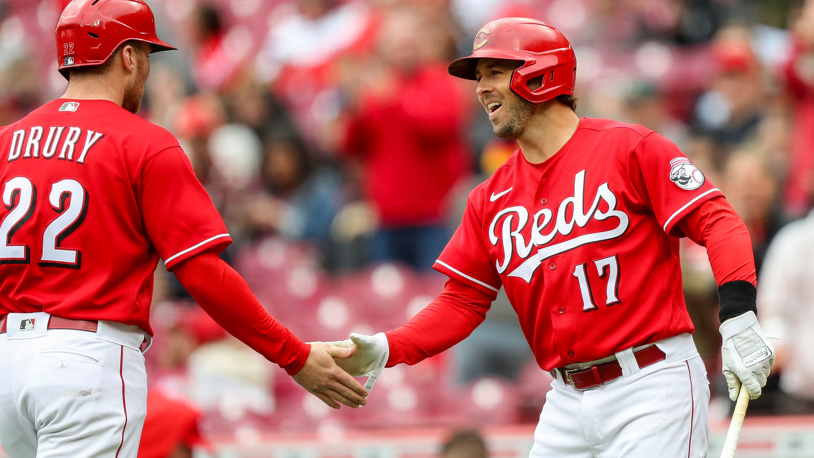 Reds beat Pirates to end nine-game losing streak with wild inning