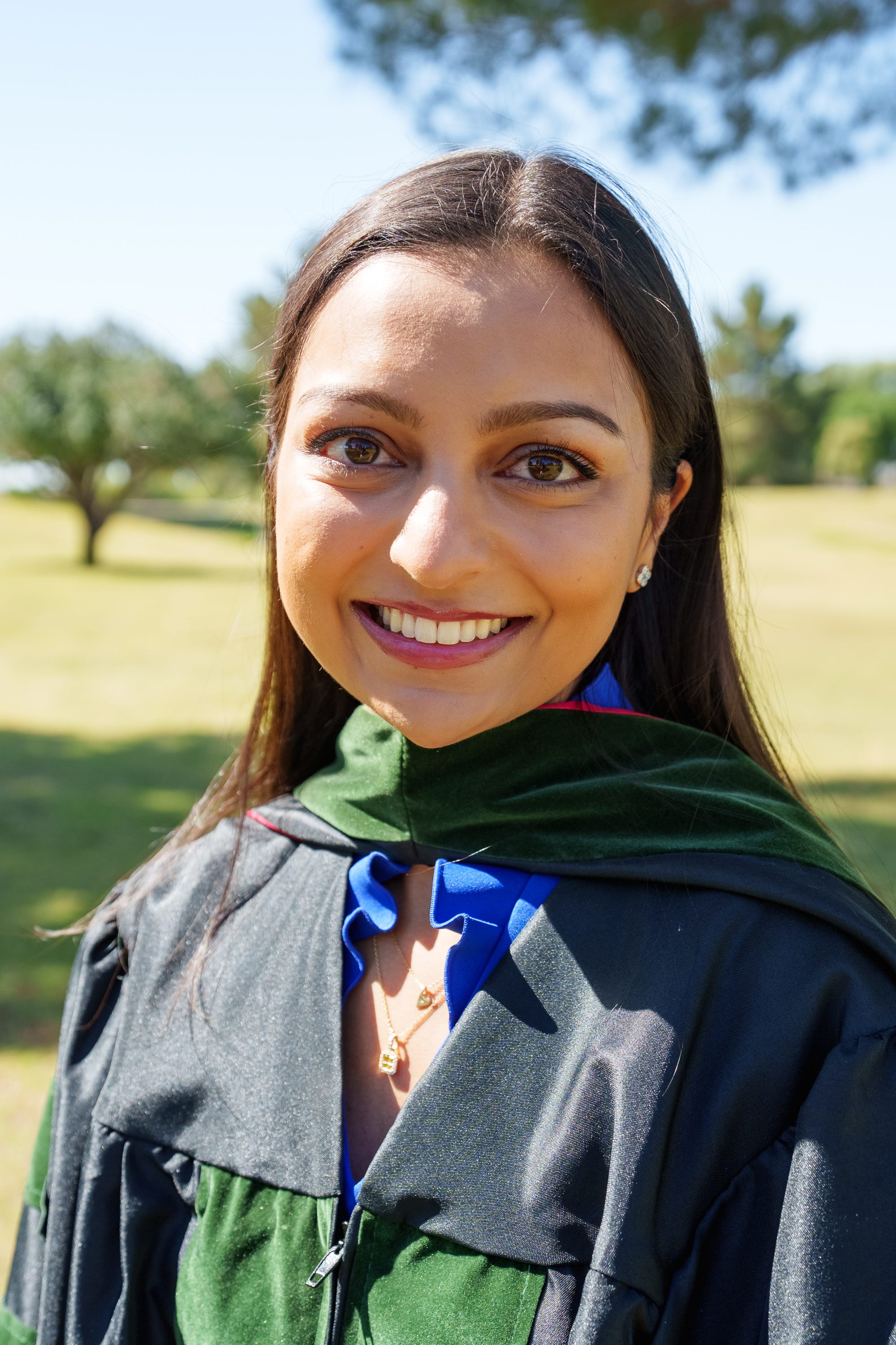 Maya Patel poses for a photo at a park near her home in Scottsdale on May 7, 2022. Maya will graduate from University of Arizona's Phoenix medical school as a doctor of medicine.
