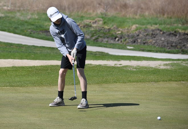 DCG's Dillon Jordan looks at the ball after putting onto the 9th hole in the Gilbert boys golf invitational at Ames Golf & Country Club Saturday, May 7, 2022, in Ames, Iowa.