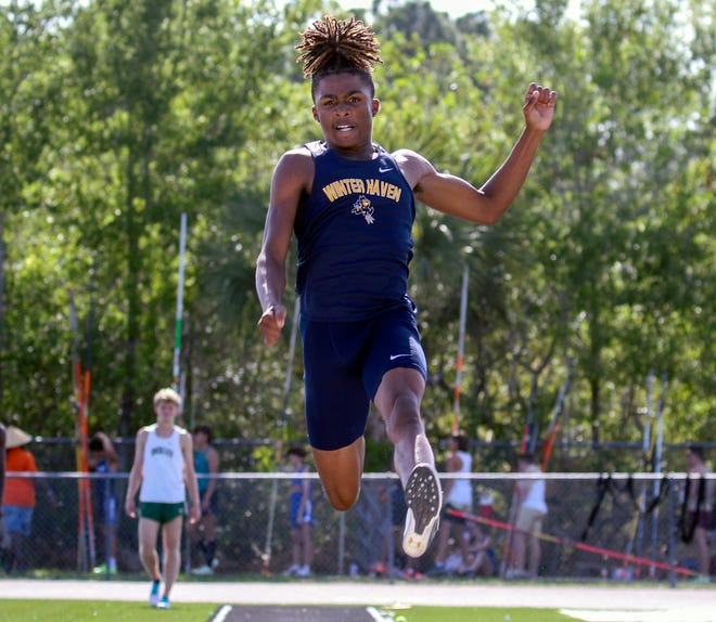 Winter Haven's Jaden Lippett competes in the long jump on Saturday at the Class 4A, Region 2 track and field meet at Alonso High School in Tampa. He won the event and went on to win the triple jump.