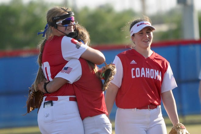 Coahoma's Hannah Wells celebrates with teammates after throwing a no-hitter against Henrietta on Saturday.