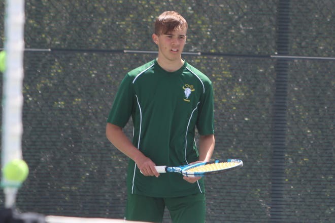 C.M. Russell junior Luca Alvisi, a foreign exchange student from Italy, prepares to receive a serve during the Rustlers' match against the Gallatin Raptors Saturday at Riverside Park's Hurd Tennis Courts. Luca is unbeaten this season and a major reason the Rustler boys are 13-0 in dual matches this Spring.
