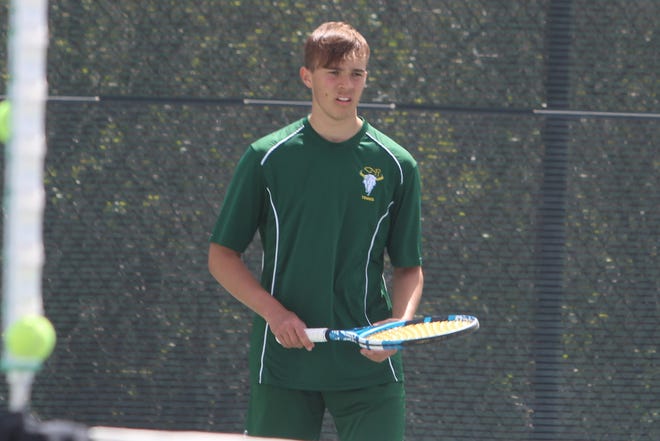 C.M. Russell junior Luca Alvisi, a foreign exchange student from Italy, prepares to receive a serve during the Rustlers' match against the Gallatin Raptors Saturday at Riverside Park's Hurd Tennis Courts. Luca is unbeaten this season and a major reason the Rustler boys are 13-0 in dual matches this Spring.