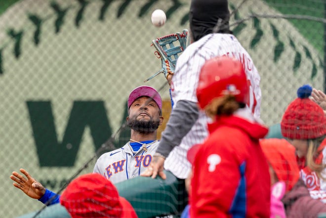 New York Mets right fielder Starling Marte (6) catches a fly ball from Philadelphia Phillies' Alec Bohm during the first inning of the first game of double header, Sunday, May 8, 2022, in Philadelphia.