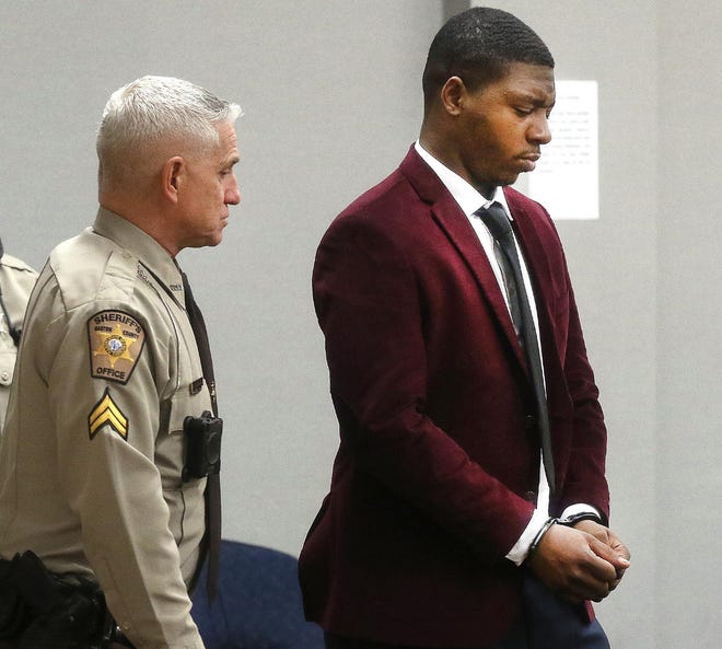A Gaston County Sheriff's deputy escorts Marquis Julius Graham to Gaston County Jail during his 2020 trial. Graham was found guilty of first-degree murder in the death of his girlfriend's 2-year-old child, Kye Rashid.