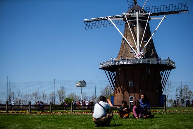Hundreds flock to Windmill Island Gardens for Tulip Time Monday, May 9, 2022, in Holland.