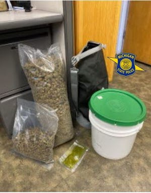 A man is facing charges after a Michigan State Police trooper found five pounds of marijuana in his vehicle on May 4 in Otsego Lake Township.