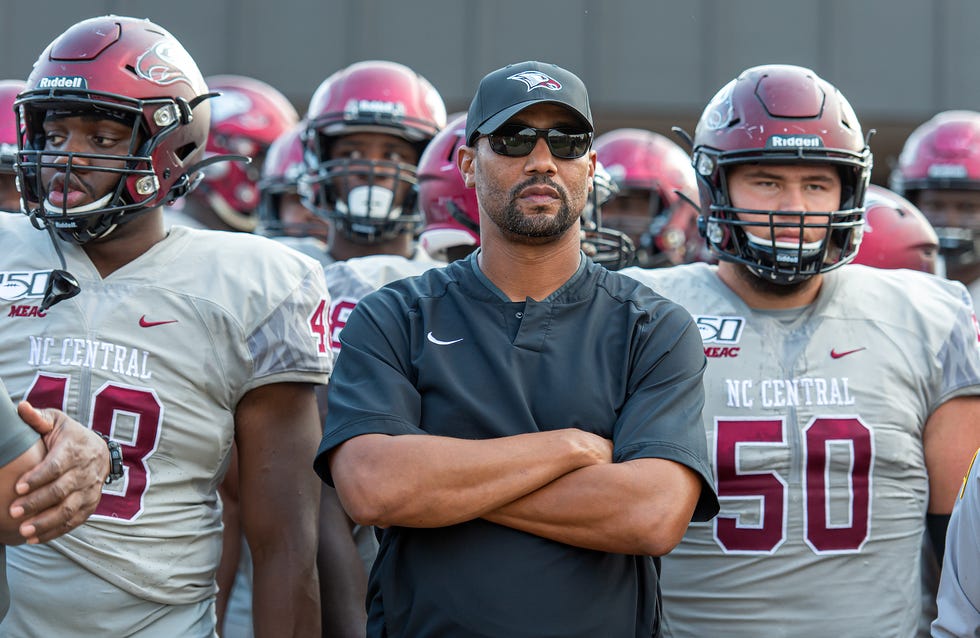 Entering his fourth year as football coach at his alma mater, N.C. Central's Trei Oliver (middle) said he sees 'somewhat of a trend' to top high school recruits committing to HBCUs over Power Five programs.