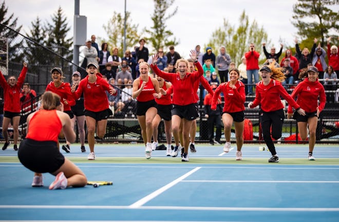 Ball State women's tennis team celebrates after winning the Mid-American Conference Tournament championship match over Toledo on May 1, 2022.