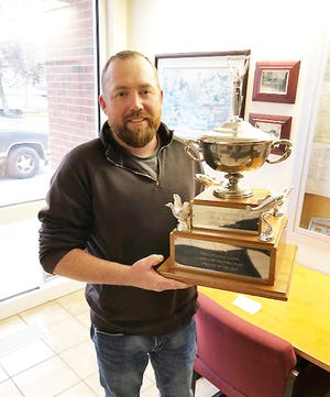 Fairbury Sewer Superintendent Brad Duncan poses with his Operator of the Year award following Wednesday's Fairbury City Council meeting at City Hall.