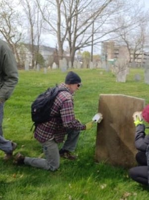 Members of the newly formed Cemetery Committee were trained by John Lord of the N.H Old Graveyard Association on the techniques to properly clean historic monuments.
