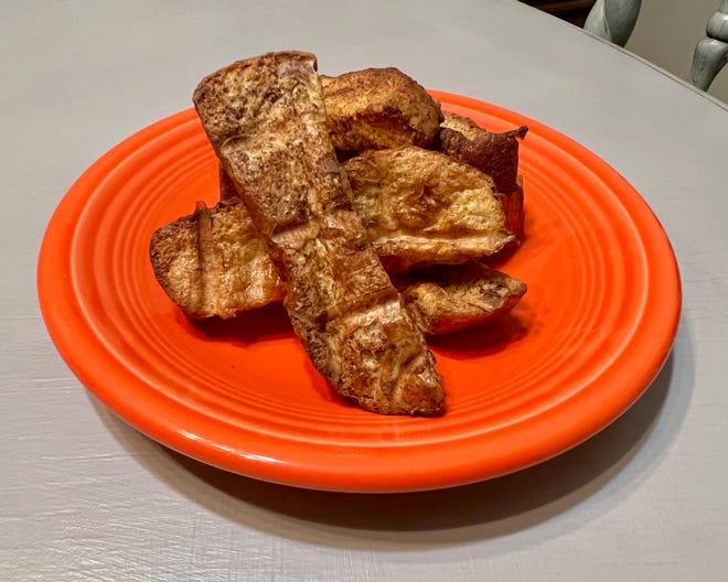 Sliced into long quarters, rather than fried as whole pieces of bread, makes French toast sticks so much more fun to eat. Cooked in the air fryer means crispy sticks to dip into syrup.