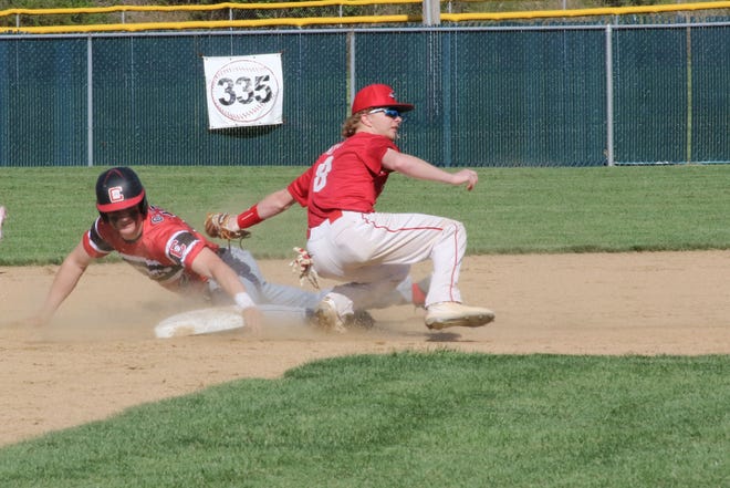 Crestview's Owen Barker (sliding) was named first team All-District 9 in Division III for his 2022 season.