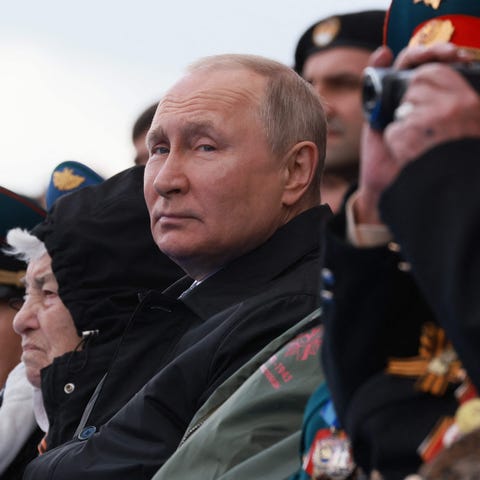 Russian President Vladimir Putin watches the Victo