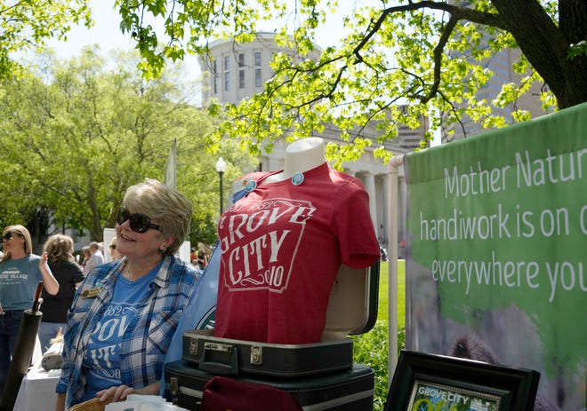 Teresa Breckenridge talks up Grove City during the TourismOhio tourism fair, which hosted tourism organizations and tourism-dependent entities on the West Plaza of the Statehouse on Wednesday.