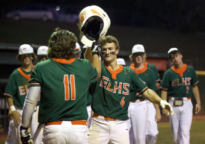 East Lincoln's Isaac Armstrong celebrates with teammates after hitting a sixth inning home run during an 8-0 win over Forestview on May 10, 2022.