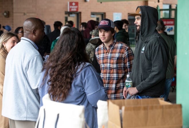 Daniel Gnad of Lacey and Timothy Scates of Manchester talk with representatives of J.F. Keily Construction. Ocean County and state labor departments host a job fair for the construction industry at ShoreTown Ballpark. Students of the Ocean County Vocational Technical Schools were brought in to apply for jobs.
Lakewood, NJ
Wednesday, May11, 2022