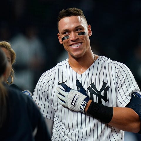 New York Yankees' Aaron Judge gestures to fans aft