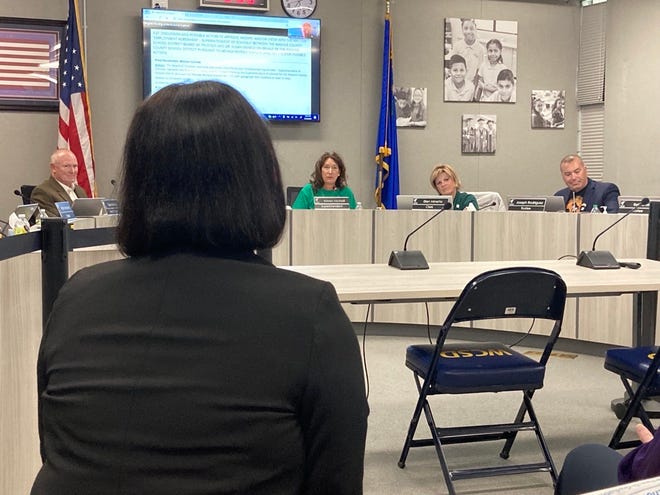 Washoe County School District Superintendent Kristen McNeill addresses Susan Enfield moments after the board voted, 6-1, to approve her contract as the next superintendent Tuesday evening.