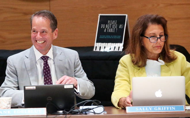 New Hampshire Education Commissioner Frank Edelblut, left, and state Board of Education member Sally Griffin take part in a board meeting at Oyster River Middle School Thursday, May 12, 2022.