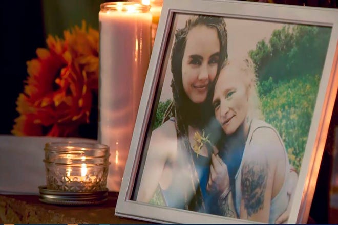 Kylen Schulte, left, and Crystal Turner are shown in a photo at a vigil in Moab, Utah, on Aug. 22, 2021.
