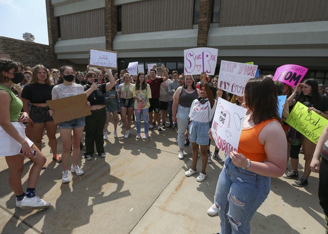 SPASH students hold signs and chant in support of Roe vs. Wade on Thursday, May 12, 2022, at SPASH in Stevens Point, Wis. Students held a walk-out to protest against the leaked United States Supreme Court decision overturning the 1973 ruling that granted the right to abortion.