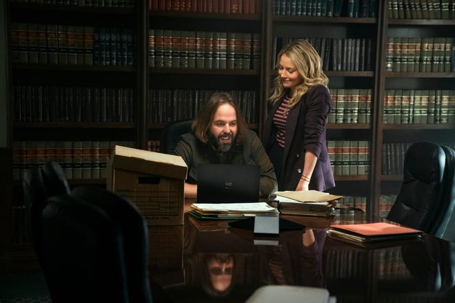 Angus Sampson as investigator Cisco and Becki Newton as legal assistant (and Mickey's second ex-wife) Lorna in "The Lincoln Lawyer."