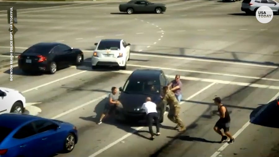 Good Samaritans save unconscious woman as car drifts through intersection