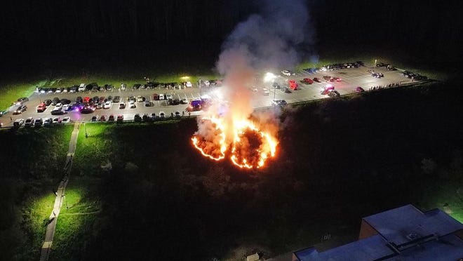 A brush fire ignited at Alfred State College on Thursday, May 12, 2022.