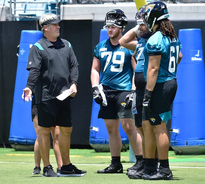 Jaguars head coach Doug Pederson talks with offensive linemen (79) Luke Fortner, (77) Nick Ford and (61) C.J. Wright during Friday's Rookie Minicamp session. The Jacksonville Jaguars held their first Rookie Minicamp on the turf of TIAA Bank Field Friday afternoon, May 13, 2022. Among those in attendance were the team's 2022 draft picks.