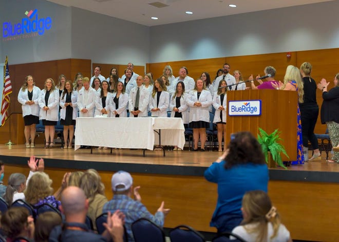 Graduates of the Blue Ridge Community College Nursing program gather together at the May 11 pinning ceremony. This traditional rite of passage honors the students' achievements before they walk across the graduation stage.