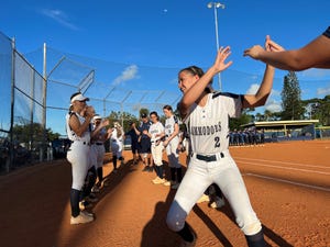 Eau Gallie High softball players are preparing for their regional FHSAA playoff game on Thursday against Oberndale on May 12, 2022.