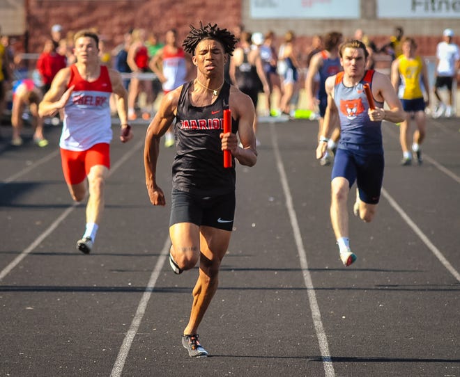 Marion Harding's Kaedan Faggs brings home the baton to a relay win during the Mid Ohio Athletic Conference Track and Field Championships this spring at Harding Stadium. Faggs was named Fahey Bank Athlete of the Month for April among Marion County males.