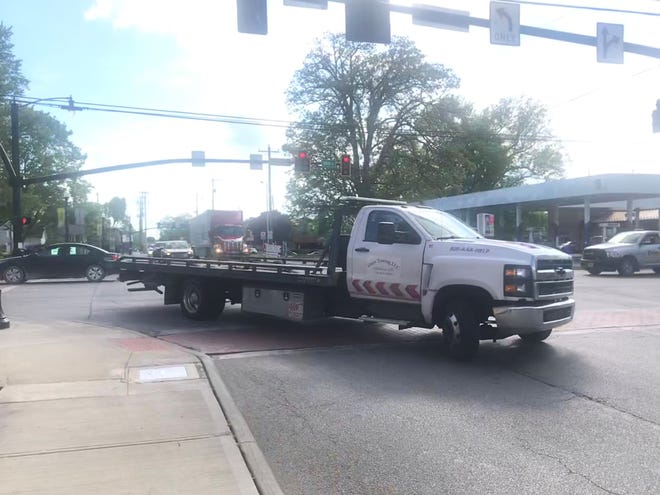 A truck turns at the intersection of U.S. 62 and Ohio 37, or Coshocton and Main streets in downtown  Johnstown. Planners have floated the idea of studying alternate routes for semi truck traffic in the city.