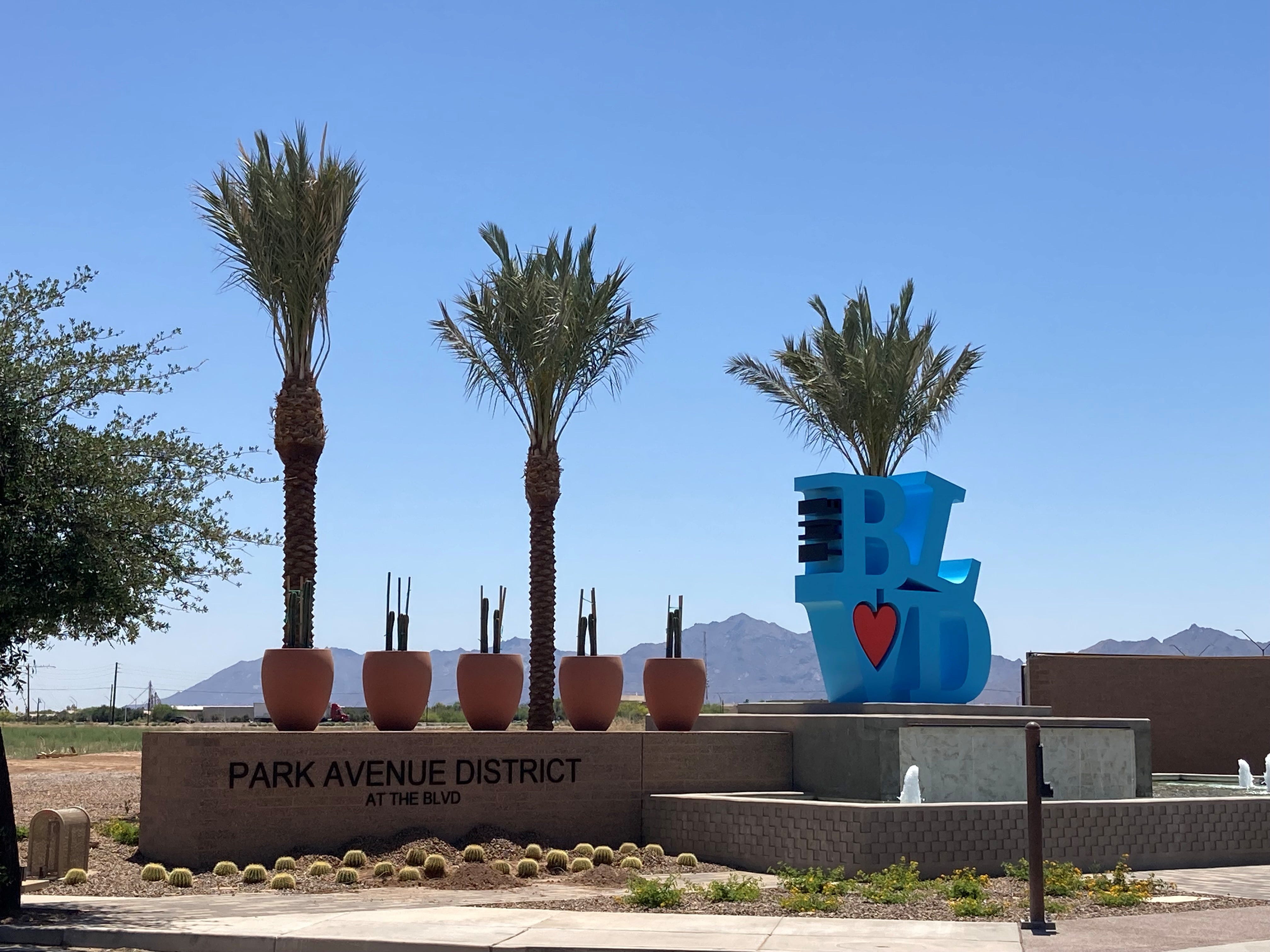 A monument entry for the BLVD in Avondale with the Estrella Mountains as a backdrop.