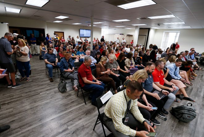 About 150 people were attending the Nexa school board meeting where the board voted to ban two books,