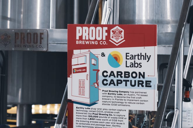 Earthly Labs "Carbon Capture" Logo and info displayed at Proof's Tallahassee brew house.