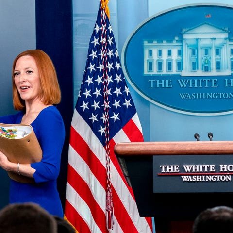 White House press secretary Jen Psaki waves goodby