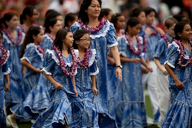 Members of the Kamehameha School Choir prepare for the 2011 NFL Pro Bowl pre-game show at Aloha Stadium in Honolulu, Hawaii.