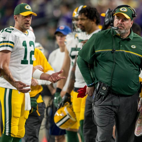 Mike McCarthy walks away from Packers QB Aaron Rod
