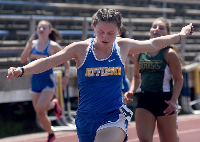 Alexa Glancy of Monroe Jefferson wins the 100 meter dash at the Mason Invitational Saturday.
