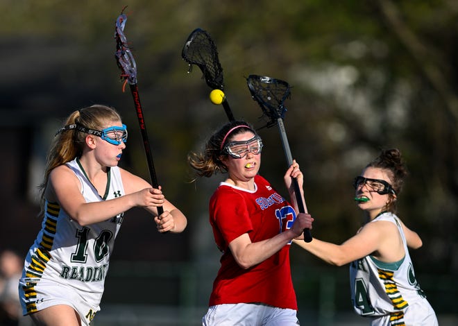 Somerville girls lacrosse sophomore captain Holly Schmidt takes a shot on goal during a game versus North Reading at North Reading High School on Friday, May 13. Schmidt leads the team in goals this spring with 34.