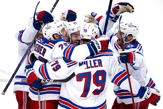 Rangers' Chris Kreider (20) celebrates his goal during the third period in Game 6 against the Penguins in Pittsburgh on Friday.